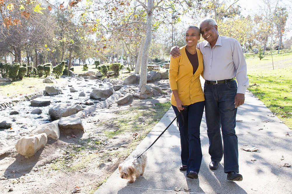 Happy couple walking outdoors